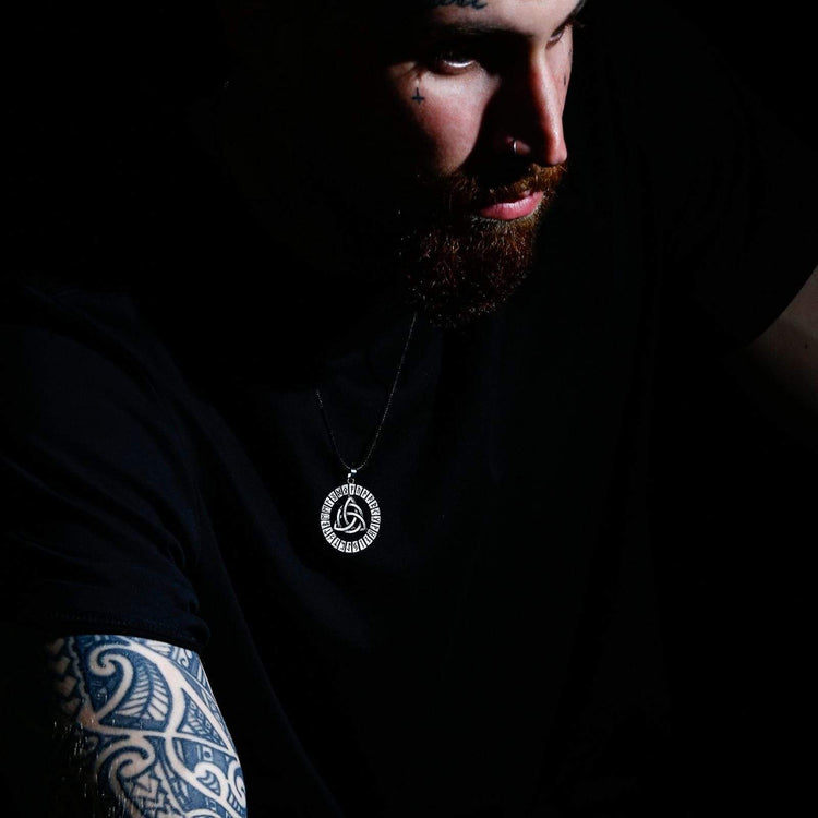 Viking necklace variant of the Breton Triskel Viking necklace variant of the Breton Triskel