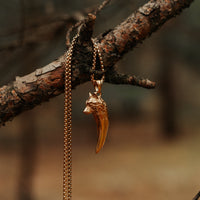 'Never give up' wolf necklace